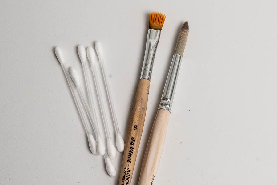 Q-Tips and brushes for smoothing
