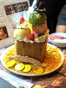 Honey toast with icecream in the shapes of a moogle and a sabotender in eorzea cafe japan - the first price in the gold saucer raffle